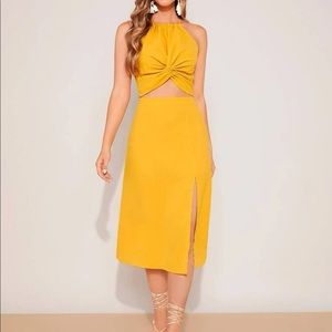 Backless crop halter top and split thigh skirt